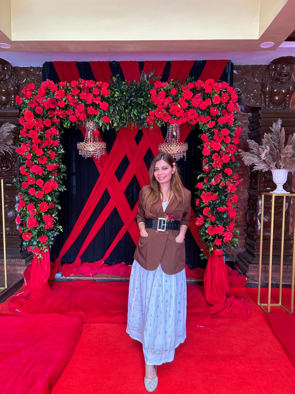 Anusha Bajgain at a floral stage event execution setup