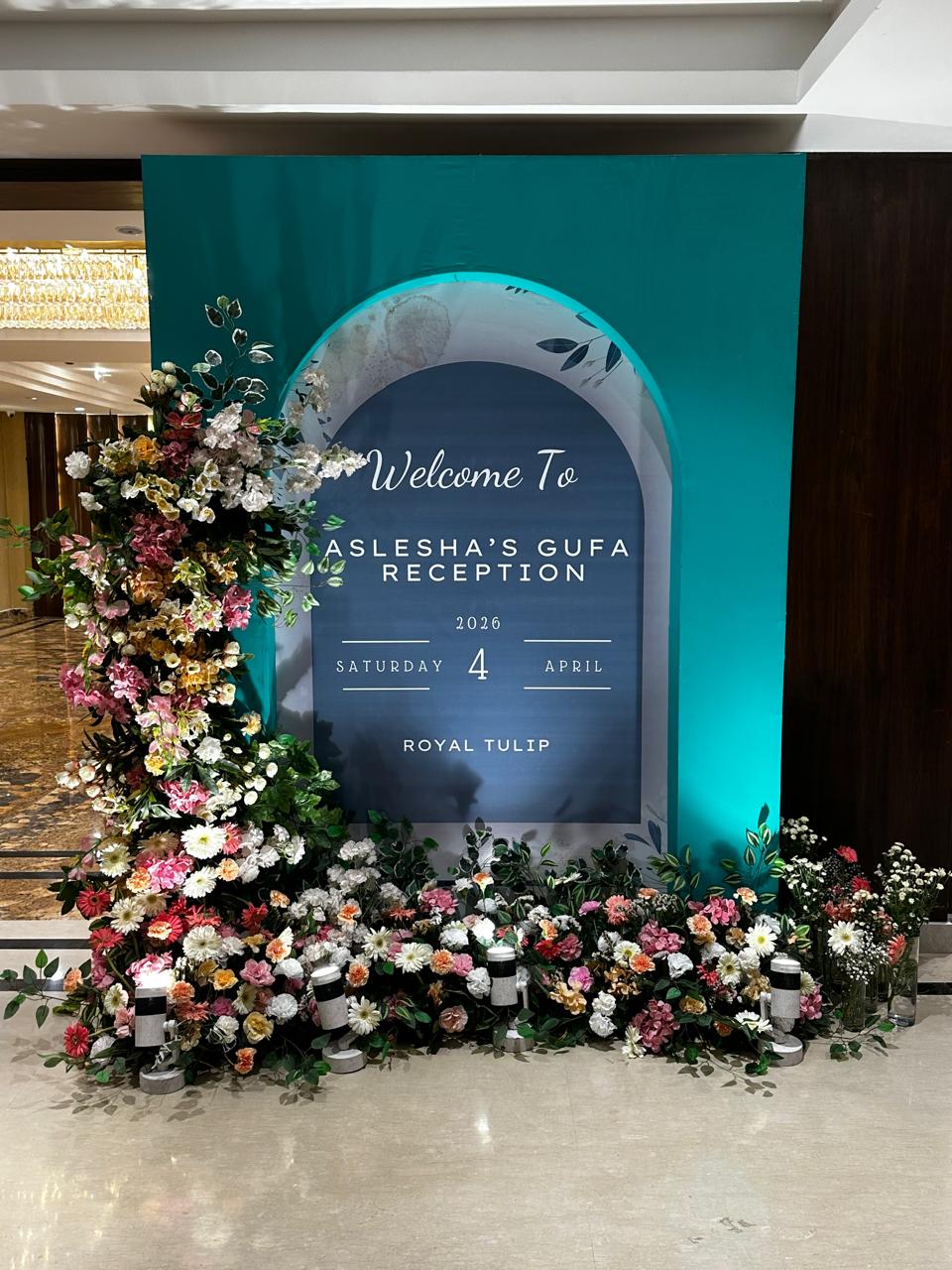 Traditional Gufa reception floral signage