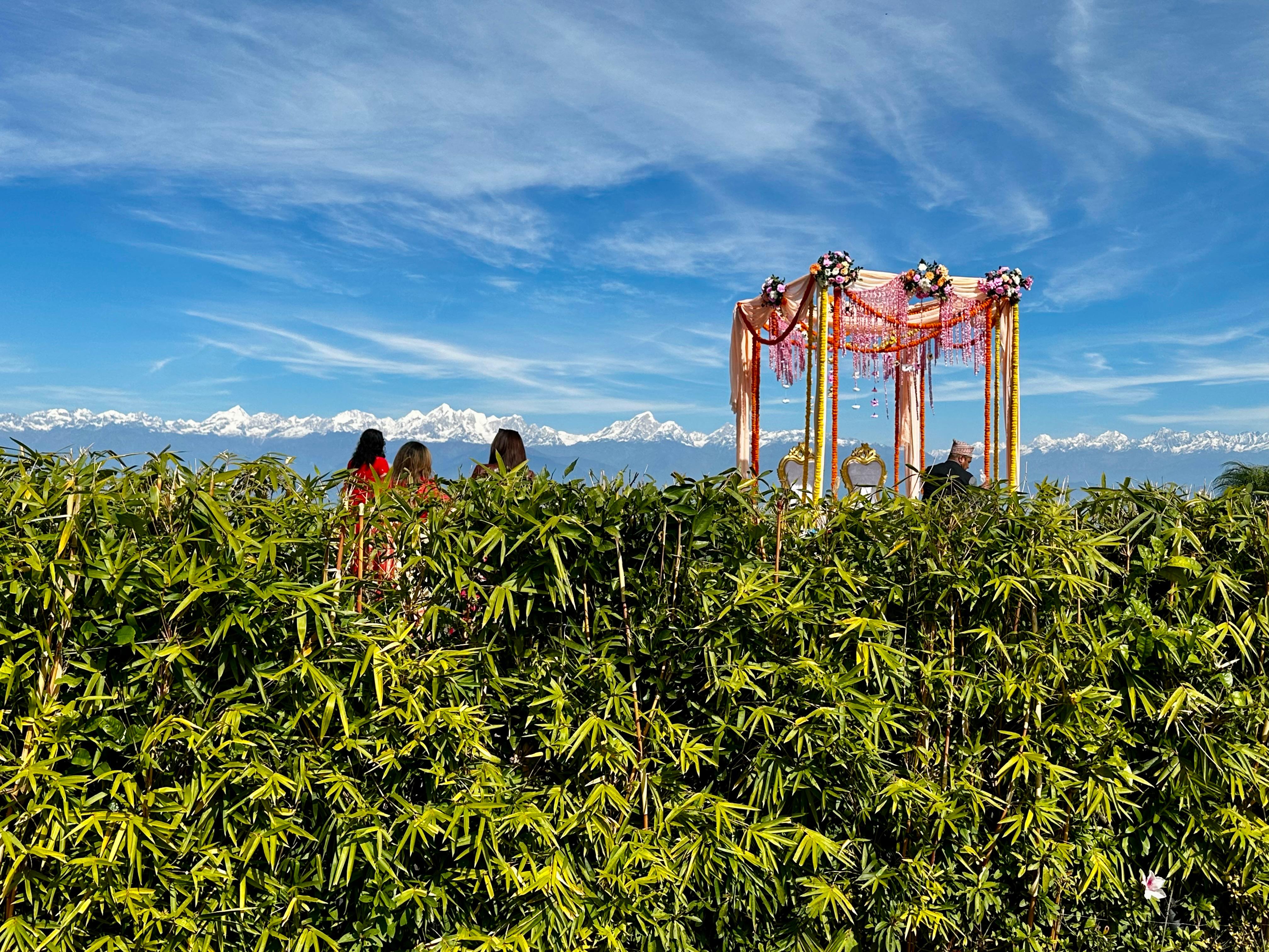 Wedding setup with a majestic mountain backdrop.